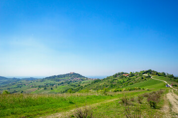 Springtime panorama of the hills range of Oltrepo Pavese. Is a winery area between Lombardy, Emilia and Piedmont Regions (Northern Italy), mainly in the Pavia Province.