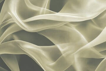 Obraz premium Delicate, flowing fabric in a muted beige tone, draped and subtly shimmering against a dark background