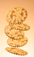 Cracker biscuits with salt flying