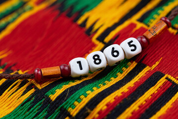 Obraz premium Handmade beaded Juneteenth bracelet with intricate African patterns