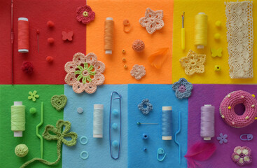 Flat lay composition of assorted colorful yarn threads, buttons, crocheted elements, safety pins, decorative tools arranged on six square felt fabric backgrounds for crafting project visualization.