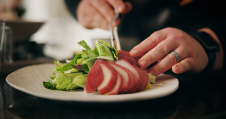 Hands, chef and meal for restaurant, healthy food and preparation for brunch in kitchen or cuisine. Catering business, employee and person with salad for lunch, cooking or skills for gourmet in diner