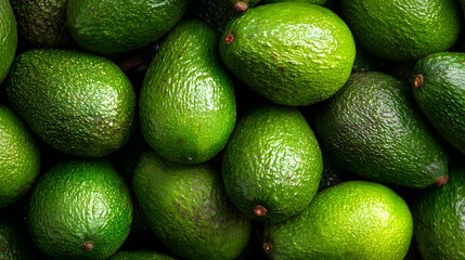 Vibrant Green Avocados in Close-Up: A Perfect Superfood for Salads, Smoothies, Guacamole, Vegan Diets, and Healthy Cooking