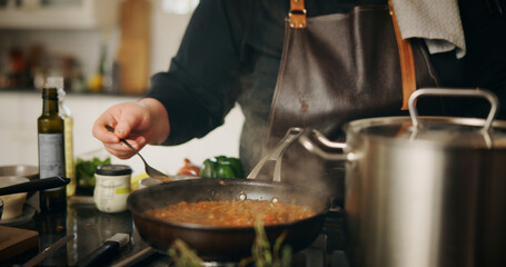 Hands, cooking and chef with spice, pot and preparation for dinner in kitchen, cuisine and restaurant. Catering, employee and person with food for supper, hospitality and skills for gourmet in diner