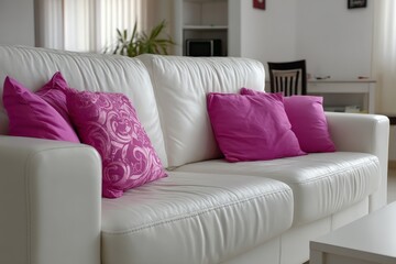 Cozy living room interior with white sofa and pink decorative pillows in modern design setting