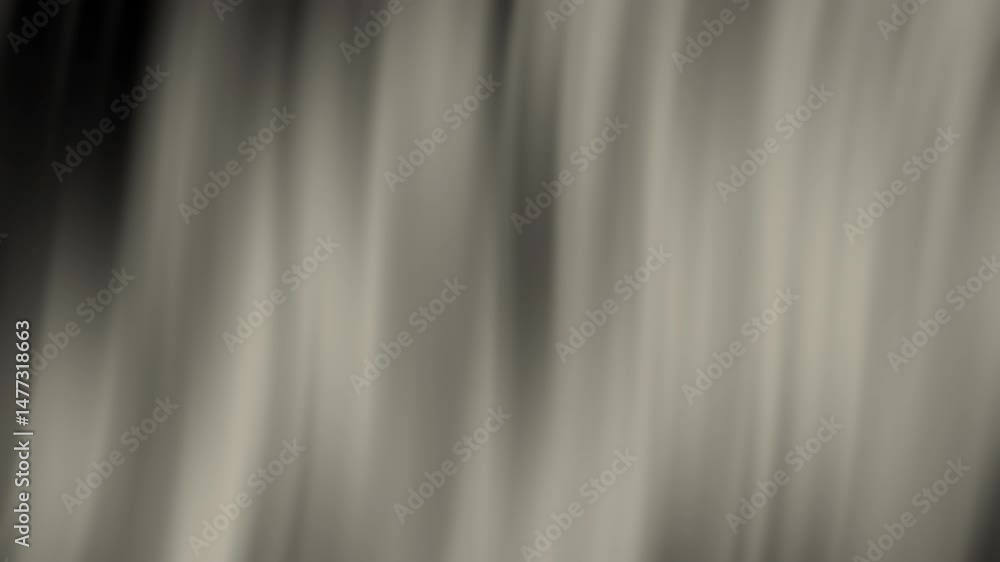 Poster a soft, vertical blur creates an abstract, monochrome background with flowing light and shadow patte