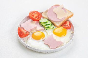 Funny breakfast toast for kids. Creative children's sandwich and cute fried eggs. Baby food menu. Breakfast for children
