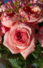 Romantic Pink Rose Bouquet with Purple Waxflower Accent