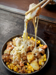 Hot Baked Corn and Potatoes with Cheese on the Stovetop