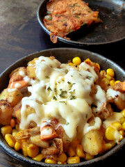 Hot Baked Corn and Potatoes with Cheese on the Stovetop
