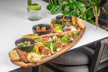 Appetizers with different antipasti, charcuterie, snacks for buffet party. antipasto board, Top view, flat lay