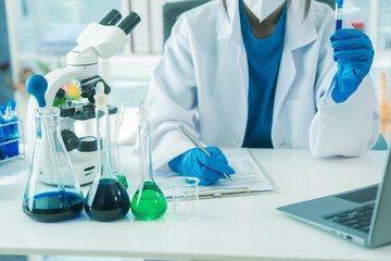 Scientists and microscopes for medical research, innovation or analysis in science or biology laboratories for vaccines.