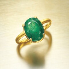 Elegant emerald ring in gold setting close up studio shot jewelry fashion accessory gemstone precious luxury design