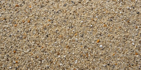 A Detailed Close-Up View of a Diverse Aggregate Mixture Featuring Small Stones in Varied Hues of Beige, White, and Yellowish-Orange
