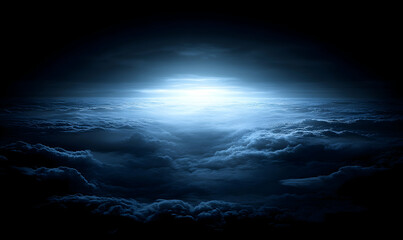 Fototapeta premium Stunning aerial view of a breathtaking seascape of clouds at night, illuminated by a bright light source.