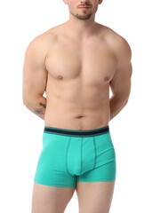 Fototapeta premium Young man in stylish turquoise underwear on white background, closeup