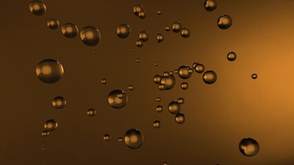 Golden bubbles floating in a sparkling liquid creating a beautiful abstract background