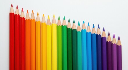 Colorful spectrum of aligned rainbow pencils showcasing vibrant creativity