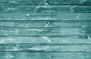Weathered cyan stained wood plank or board floor.