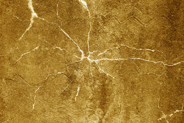Cracked orange cement wall texture.