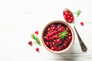 Cranberry sauce in a bowl top view.