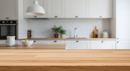 Fototapeta premium Modern kitchen interior with wooden countertop and blurred background for product display or lifestyle imagery