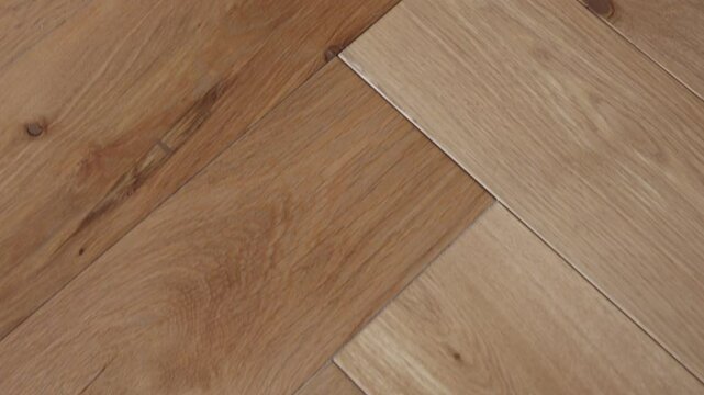 Texture of wooden parquet with natural pattern. Wooden parquet board, new laminate natural parquet close up