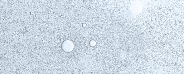 Textured background of cosmetic moisturizing gel or skin serum