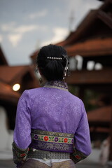 rear view of a girl in a white dress
