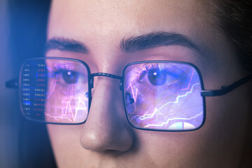 Stock exchange. Trader analyzing data, closeup. Graphs reflecting in her eyeglasses