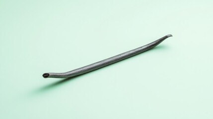 Metal tool, likely for shaping or adjusting