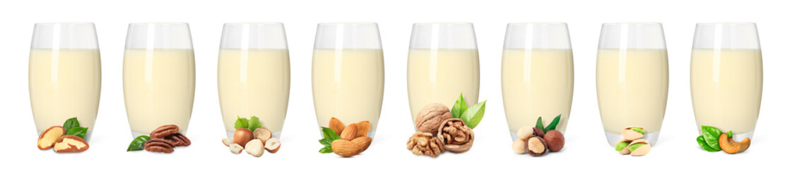 Different types of nut milk in glasses isolated on white, set