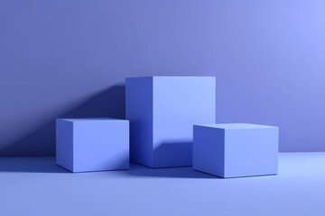 Obraz premium Three blue cubes of varying sizes arranged on a blue surface with a matching background
