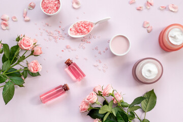 Skin care cosmetic products with roses essential oil. Beauty routine concept
