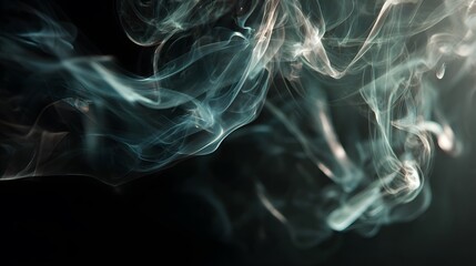 Obraz premium Delicate wisps of light blue and white smoke gracefully curl and dance against a stark black background.