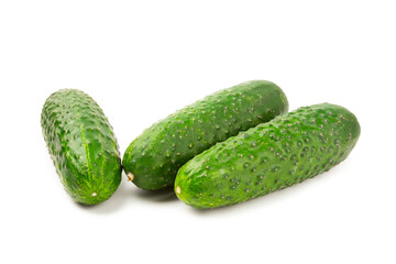 Cucumber isolated on white background. Slice of cucumber on white background. Fresh organic green cucumbers. Vegan. Ingredient for salad. Farm vegetables.