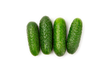 Cucumber isolated on white background. Slice of cucumber on white background. Fresh organic green cucumbers. Vegan. Ingredient for salad. Farm vegetables.