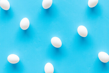 Background of chicken eggs, top view. Food pattern. Easter background