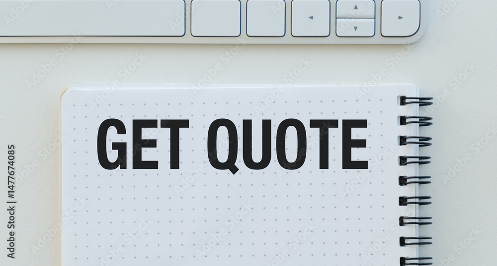 Poster a spiral notebook with the words get quote written on it