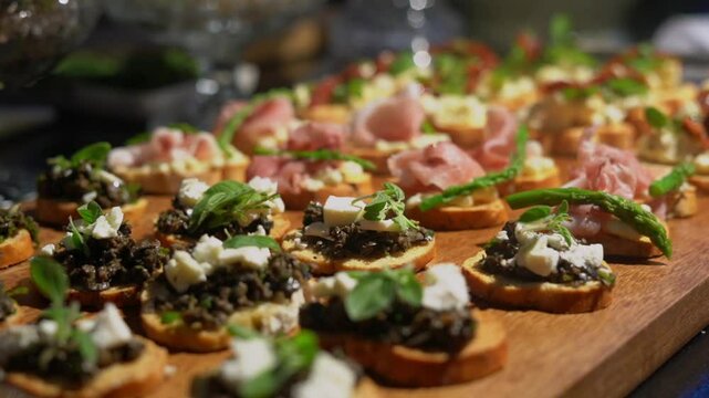 a wedding banquet table with different types of tapas and appetizers