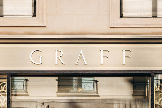 Paris, France - 23 February 2025: Graff boutique sign near Place Vend&ocirc;me, elegant white logo on beige stone facade