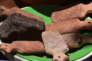 Foot scrubs made from natural clay and terracotta are 
