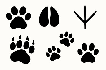 Fototapeta premium Animal Tracks and Footprints Black Icons Set vector