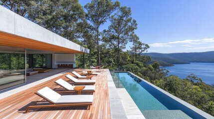 Obraz premium Modern house with infinity pool overlooking a tranquil lake.