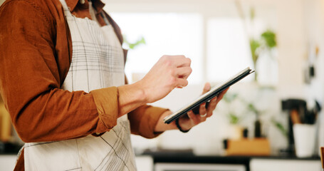 Hands, tablet and man in kitchen, food website and message to contact, online recipe and instructions. Closeup, person and chef with tech, home and digital app for ingredients or research for cooking
