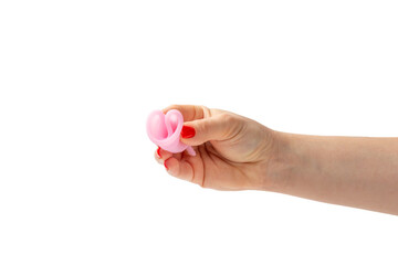 Menstrual cup in hands isolated on white background. Concept of critical days, menstruation.feminine hygiene product. Women health concept.Premenstrual syndrome.