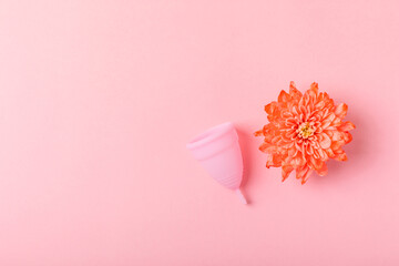 Menstrual cup on a bright background. Sanitary napkins, tampons and menstrual cup.Concept of...