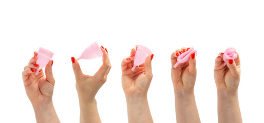 Menstrual cup in hands isolated on white background. Concept of critical days,...