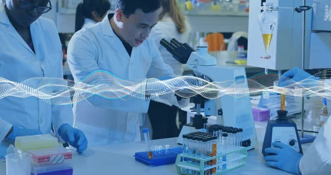 Scientists conducting research in lab, with animated data overlays on test tubes and microscope