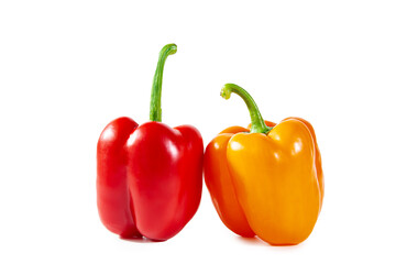 Fresh juicy shiny red and orange bell peppers.